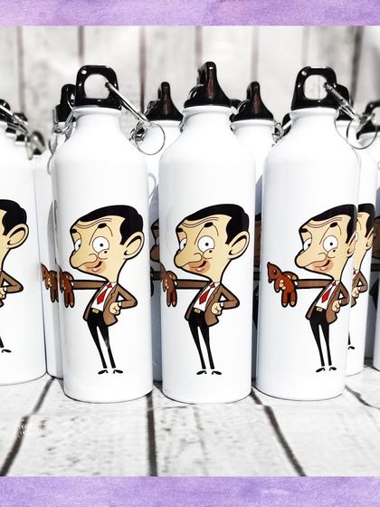 A batch of the Mr. Bean water bottles, each featuring the iconic character and his teddy bear.