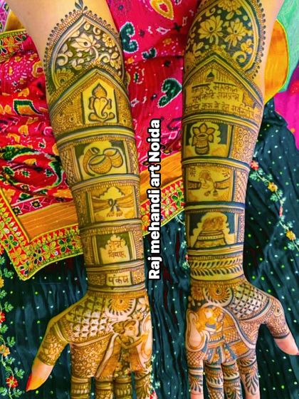 This design combines religious and wedding themes. It features a Ganesha motif for blessings, along with portraits and auspicious symbols like the kalash and shankh.