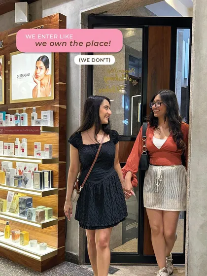 We enter like we own the place (we don't). Two best friends arriving hand-in-hand at the salon, ready for their shared beauty therapy session.