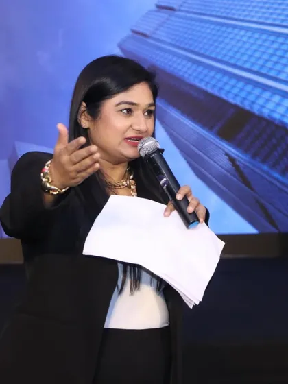 Using gestures to emphasize a point during the NPCI 'Aggregator Accelerator Workshop'.
