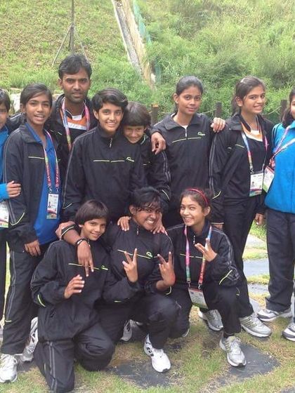 With my students at the Cadet World Championship. Traveling and competing internationally is a key part of the journey for our dedicated athletes.