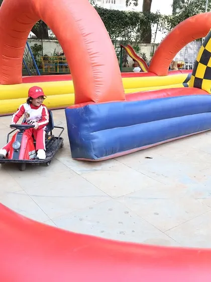 The mini go-kart track was the star attraction of this outdoor party. I can arrange for these exciting rides to give kids a real racing experience in a safe, inflatable environment.