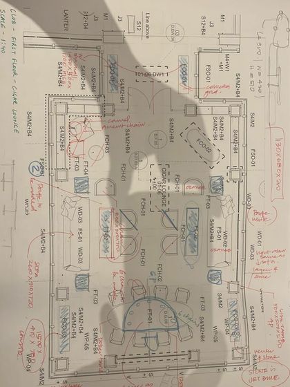 An annotated furniture layout plan for a club lounge. Every placement and selection is carefully considered to optimize flow, comfort, and social interaction.