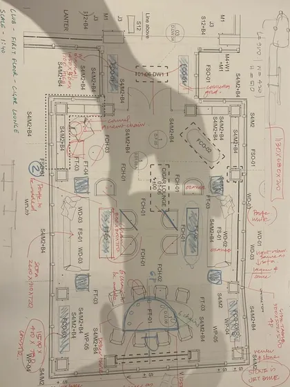 An annotated furniture layout plan for a club lounge. Every placement and selection is carefully considered to optimize flow, comfort, and social interaction.