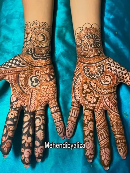 A modern design with geometric motifs and a central 'Om' symbol. The finger designs are unique and stylish.