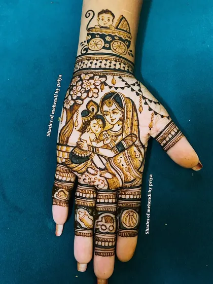 A heartwarming depiction of Maa Yashoda with little Krishna. This design is perfect for celebrating motherhood, often chosen for baby showers.