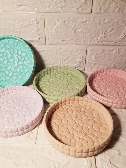 Our round marshmallow trays in a variety of soft pastel colors, perfect for organizing small items.