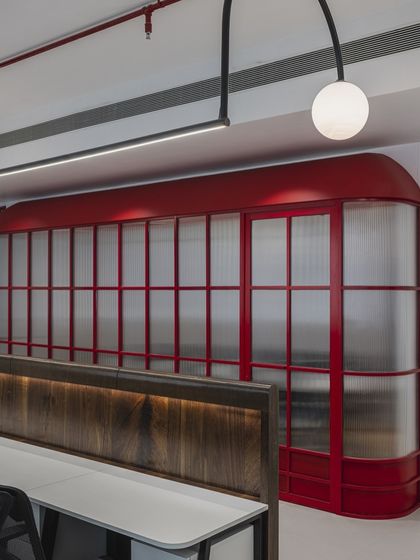 We believe work can be exciting, so we gave this 3200 sq. ft. Mumbai office a whimsical twist. The conference room is inspired by the iconic UK telephone booth, infusing a playful and memorable element into the daily work environment.