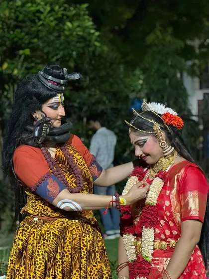 Parvati adjusting Shiva's attire. These small, intimate gestures help to build the characters and make their relationship feel real and relatable to the audience.