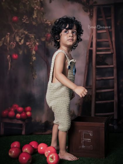 Capturing innocence, one giggle at a time. This little boy is exploring our woodland-themed set.