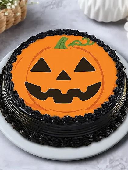 A classic Jack-o'-lantern design for Halloween. This fun and festive pumpkin face cake is a hit with both kids and adults.