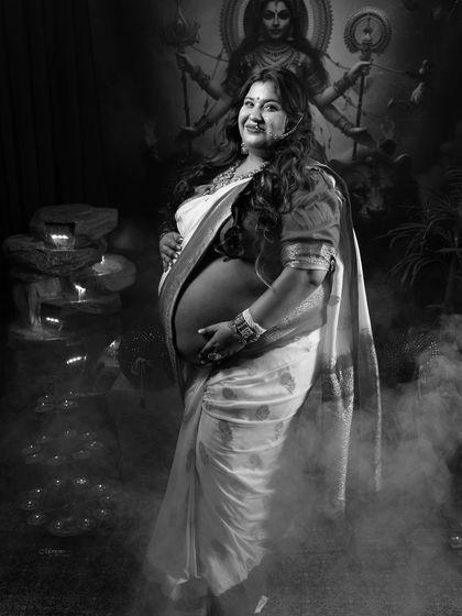 Every woman is a goddess. This powerful black and white portrait, inspired by Durga Maa, channels strength, grace, and divinity.