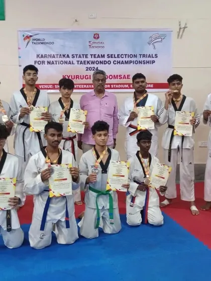 Our students proudly displaying their medals and certificates at the Karnataka State Team Selection Trials for the National Taekwondo Championship.