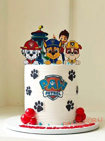 No job is too big, no pup is too small for this Paw Patrol-themed cake. This tall cake features a textured buttercream finish and is decorated with the beloved characters Chase, Marshall, and Rubble.