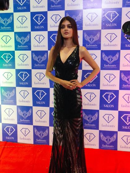 Another shot of Madhumita Sarcar at the event, looking stunning in a black sequin gown.