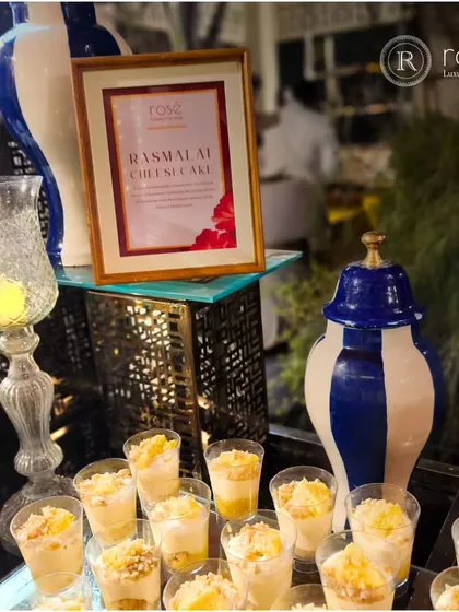 Our Rasmalai Cheesecake is a delightful fusion dessert. Served in individual glasses, it combines the creamy texture of cheesecake with the delicate, saffron-infused flavor of the classic Indian sweet.