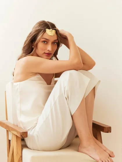 A clean, minimalist setup to showcase this delicate headpiece. The simple styling keeps the focus entirely on the jewelry.