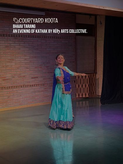 A moment from 'Bhaav Tarang', an evening of Kathak by the Rūḥ Arts Collective. The dancer's joyful expression and colourful costume light up the stage, capturing the vibrant spirit of the performance.