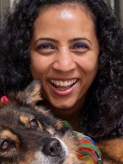 The pure, uninhibited joy on Deepthi's face as she plays with her dog, Mocha. This is what my sessions are all about: capturing real emotions.