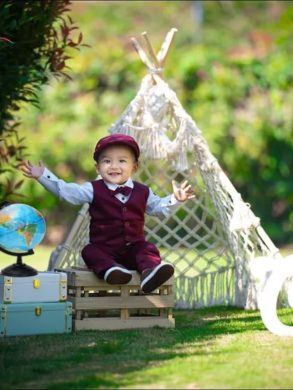 While my studio is fully equipped, I also love taking our sessions outdoors. A beautiful park setting provides a natural, timeless backdrop for capturing your little one's adventurous spirit as they celebrate turning one.