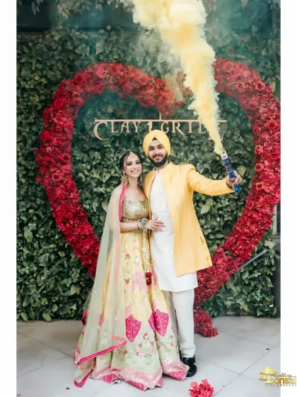 The energy of a Haldi ceremony is infectious. I love capturing the explosion of color and joy, like this moment with a smoke bomb adding a touch of modern fun to a traditional celebration. It's all about vibrant, lively wedding photography.
