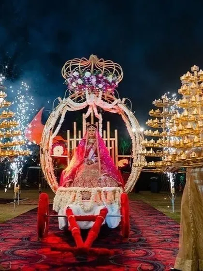 We create fairy tale entrances, like this stunning custom-designed palki for the bride. This regal chariot, adorned with flowers and carried by attendants with diyas and cold pyro sparklers, ensures a truly royal and memorable bridal entry.