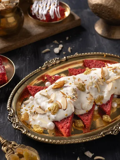 This is not your average mithai. I shot this Red Velvet Shahi Tukda with dark, moody lighting and a vintage brass platter to give it a luxurious and gourmet feel, blending tradition with modernity.