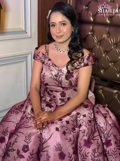 A full view of this client's beautiful floral engagement gown. The makeup is kept soft and romantic to match the dress.
