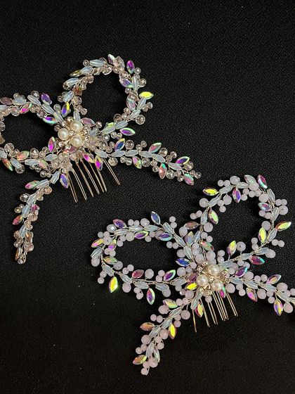 These crystal bows are perfect for brides or bridesmaids. They are selling out fast, so grab yours soon.