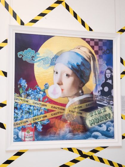 "The Art of Rebellion" is a lenticular work that transforms masterpieces. Here, the "Girl with a Pearl Earring" is brought into the present, blowing bubblegum with a "CAUTION" tape overlay.