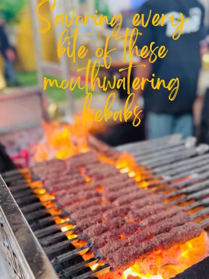 A close-up shot of mouthwatering kebabs cooking over glowing embers, capturing the essence of a traditional barbecue.
