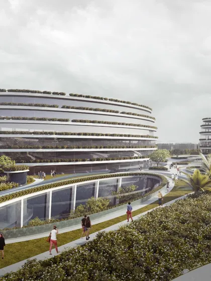 A view of the landscaped walkways connecting the different parts of the development, promoting a pedestrian-friendly environment.
