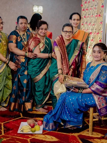 The bride poses with the women of her family after the beautiful ritual.