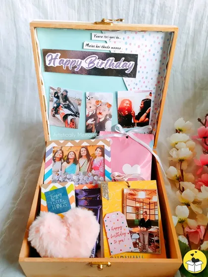 A bright and cheerful birthday hamper, packed with personalized photo items and colorful goodies.