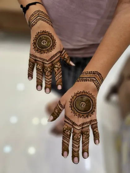 A minimalist mandala design for a baby shower. This is a great option for someone who wants a simple yet elegant henna design for their godh bharai ceremony.