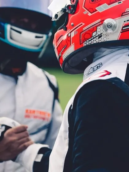 A moment of sportsmanship between two competitors before a race.