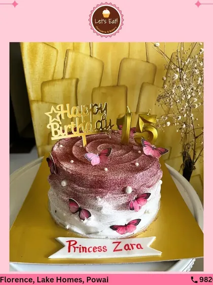 A beautiful butterfly-themed cake for a princess. The cake features a lovely pink and white ombre effect with edible glitter and delicate wafer-paper butterflies, creating a dreamy and elegant look.