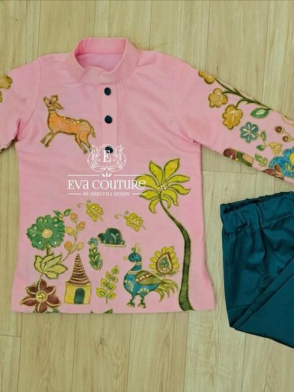 A similar Kalamkari kurta in pink, paired with dark green pajamas. The colors and designs can be fully customized.