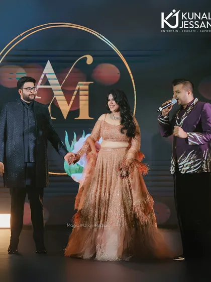 On stage with the beautiful couple at their Sangeet in Thailand. Hosting a destination wedding means creating a world-class experience that feels both grand and personal.