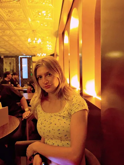 A guest enjoying a quiet moment at her table.
