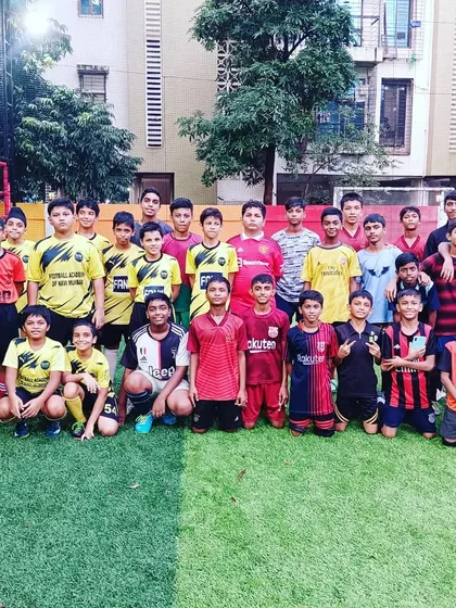 A group photo after a friendly practice match, where players from different teams come together.