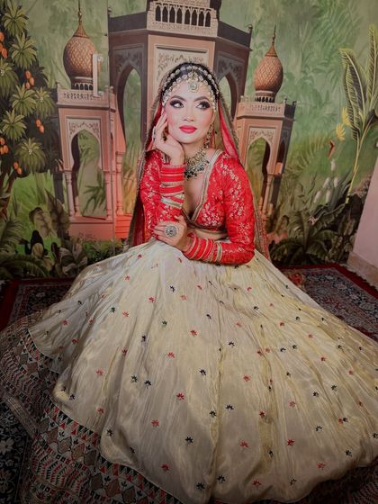 A full-length shot showing the grandeur of the bridal outfit. The makeup stands out beautifully, completing the entire look.