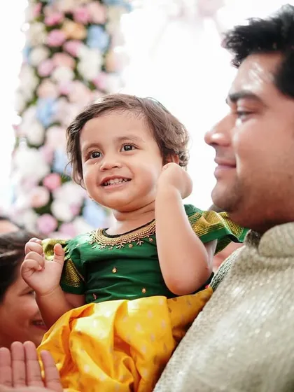 The innocent joy of a child at a wedding. We always keep an eye out for these sweet, heartwarming moments that add another layer to the story.