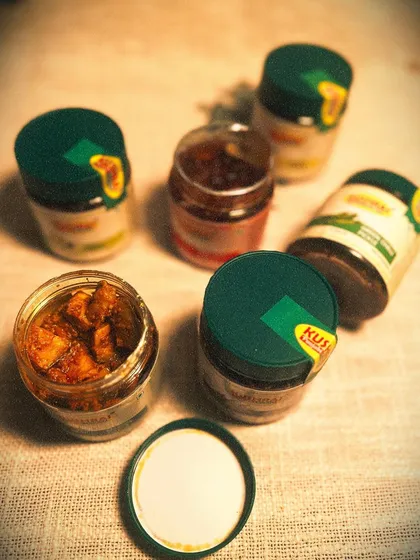 An assortment of my homemade Punjabi pickles. Each jar is sealed to lock in the freshness and authentic 'ghar ka swad'.