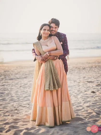 Revant and Soha wrapped in a warm embrace on a serene beach. The soft light and their connection make for a perfect romantic photograph.