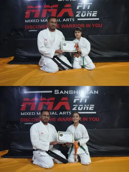 Two more of our dedicated young students being awarded their green belts. Their progress is a testament to their consistent training.