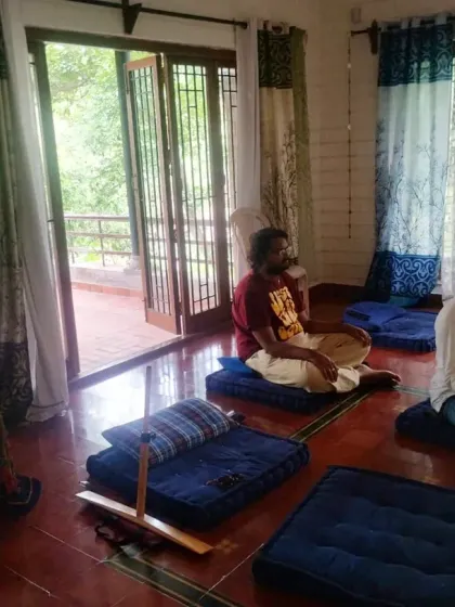 A view of our meditation room during a Sunday satsang. Devotees are absorbed in meditation, creating a powerful atmosphere of peace and concentration.