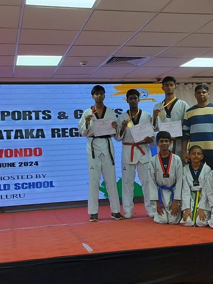 Kim's Taekwondo Academy - Competitive Taekwondo Coaching Our Champions: A Legacy of Medals photo 9