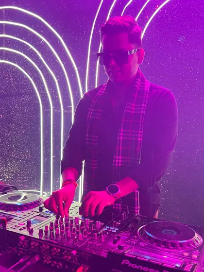 Building my brand, one gig at a time. This shot is from a wedding event with a cool neon light setup.