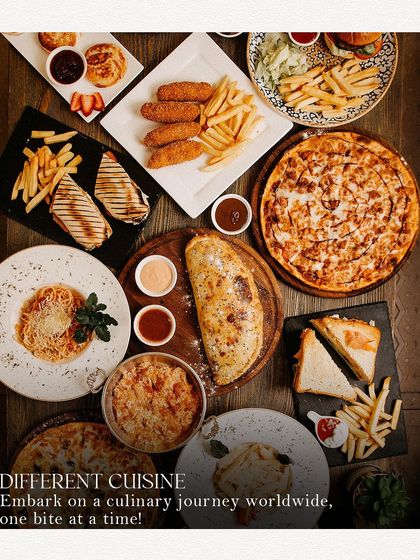 A vibrant flat-lay of delicious food from the World Food Carnival. This image showcases the variety available, from pizza and pasta to sandwiches and fries, promising a culinary journey.